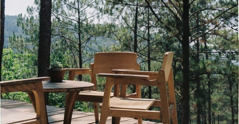 Timber deck with table and chairs overlooking woodland, the kind of surface that needs the lowest workable pressure