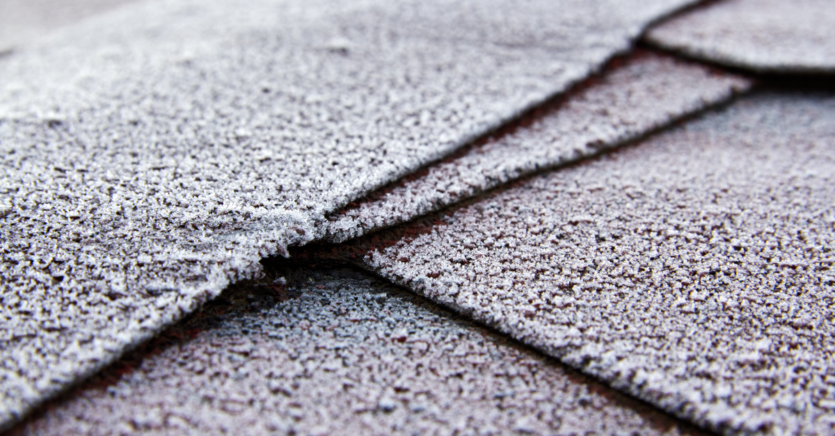 Frost sitting on roof shingles, the cold surface that slows a hypochlorite solution right down
