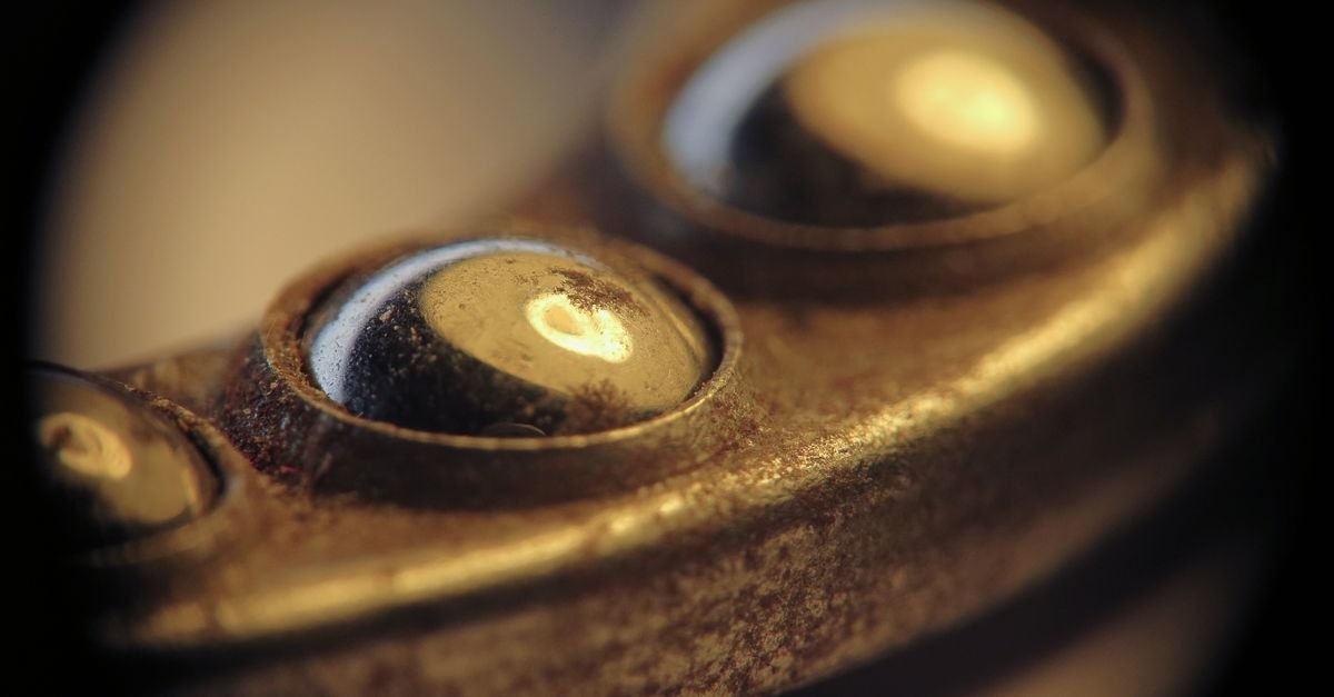 Macro view of polished steel ball bearings of the type used as retaining detents inside a quick connect coupler