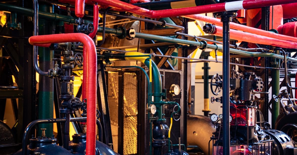 A closed network of industrial pipework carrying water in a continuous recirculating loop