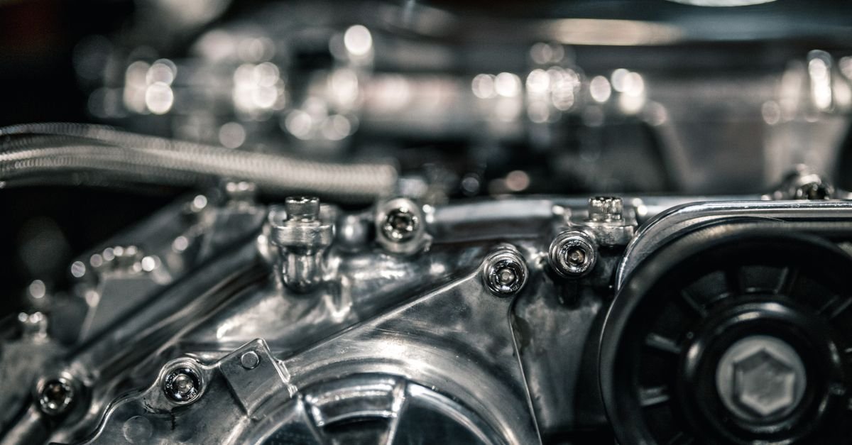 Close-up of a cast metal housing with bolts and fittings, the kind of pump head casting worth inspecting before buying
