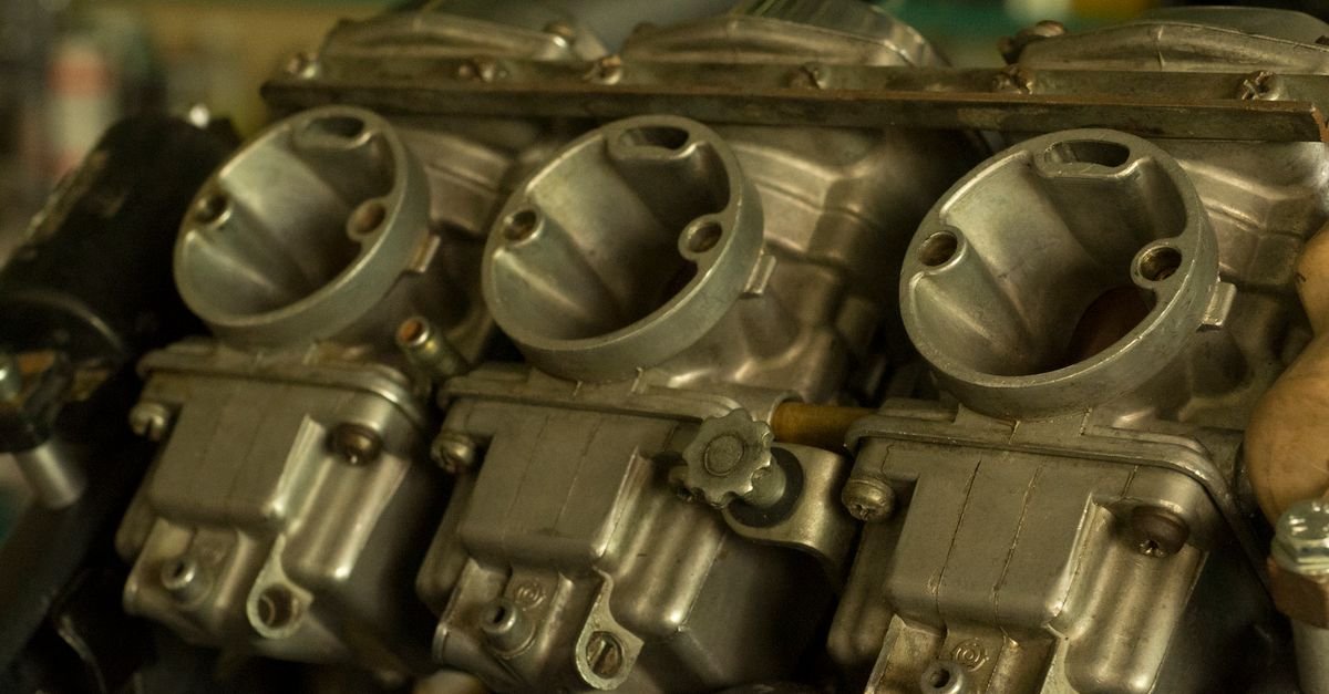 A close-up view of a small engine carburetor, the circuit that goes lean and sets a governor hunting