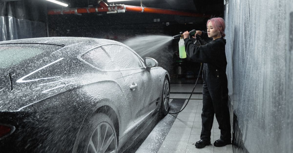 A person using a pressure washer trigger gun, the closed-trigger test that tells you which failure mode you have