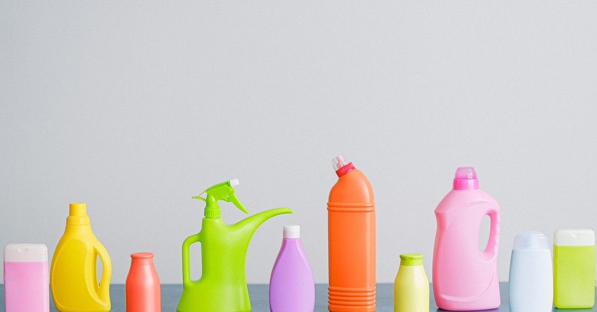 An arrangement of assorted plastic bottles of household cleaning products