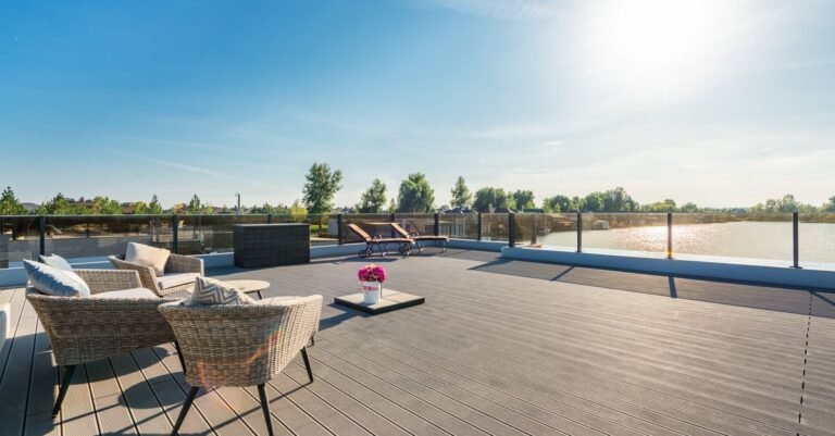 Gray composite deck boards with a smooth, uniform surface requiring manufacturer-specific pressure limits