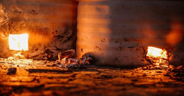 Close-up of a burner flame inside an industrial combustion chamber, the heat source a hot water machine adds to a pressure washer