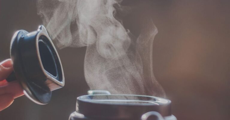Steam rising from the lid of an open pot of boiling water, the 212-degree ceiling every steam cleaner listing is measured above